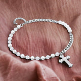 Gleaming Silver Pearl Cross Necklace